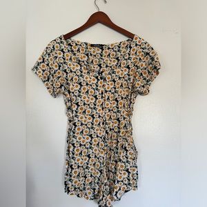 Daisy Romper with adjustable lace sides